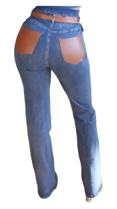 High-waisted jeans with leather pockets and wide leg straps